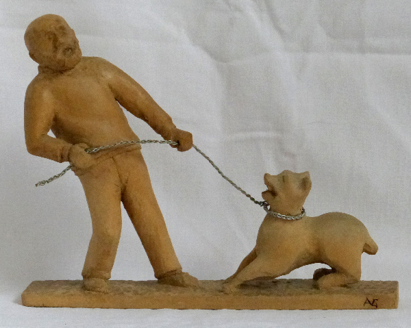 Homme au chien. Sculpture en bois et fil de fer. Signé A.G. Largeur 30 cm Hauteur 18.art modeste, art singulier. Modestes et hardis.